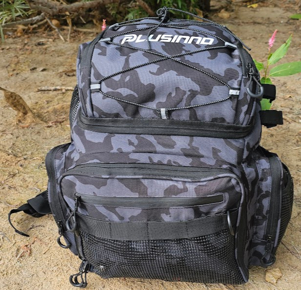 PLUSINNO Fishing Backpack Review showing camo 45L tackle bag on shore